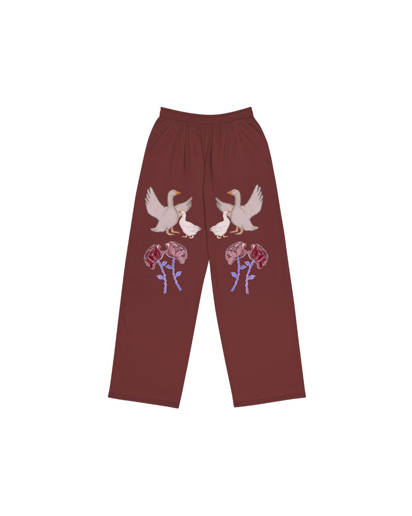 Elegante burgundy broek met unieke print. Broek met rechte pijpen en praktische zakken. 